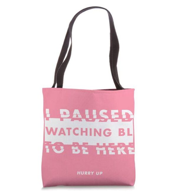 pink tote bag with text in white letters saying i paused BL to be here hurry up